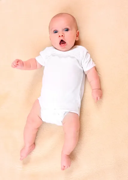 Cute baby on a plushy blanket. — Stock Photo, Image