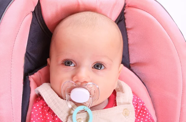 Baby in safety seat. Safety and insurance concept — Stock Photo, Image