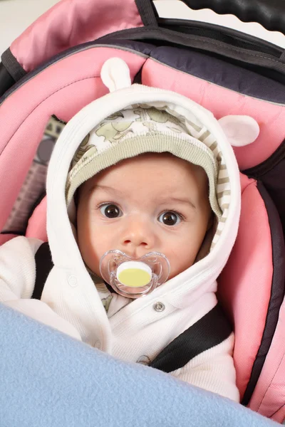 Baby in safety seat. Safety and insurance concept — Stock Photo, Image