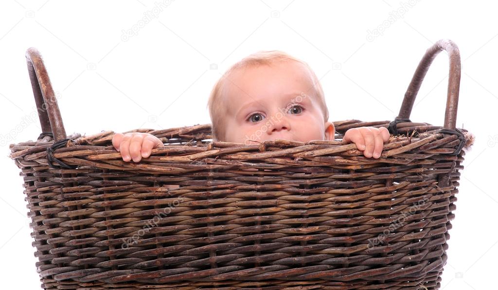 Hiding child in a basket.