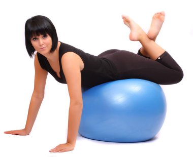 pilates topu olan kadın.