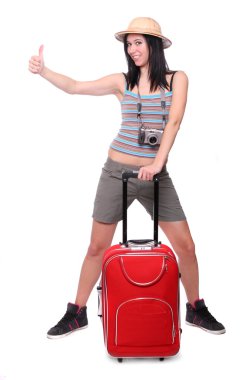 genç kadın kamera ve çantası ile tatile gitmek.