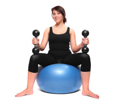 egzersiz ve dumbells ile çalışma dışarı bir vücut geliştirmeci kadın.