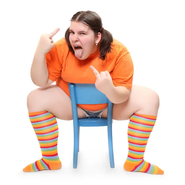 Crazy teenager on a blue chair. Behavioral disturbance in the pubescence. — Stock Photo, Image