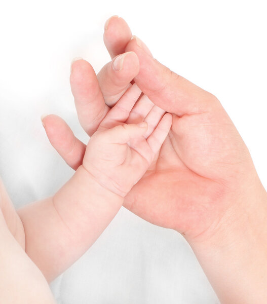 Mothers and baby hand.