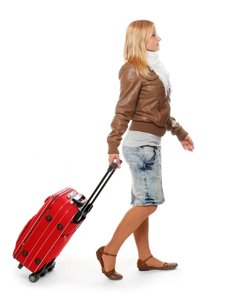 Lány piros bőrönddel. — Stock Fotó