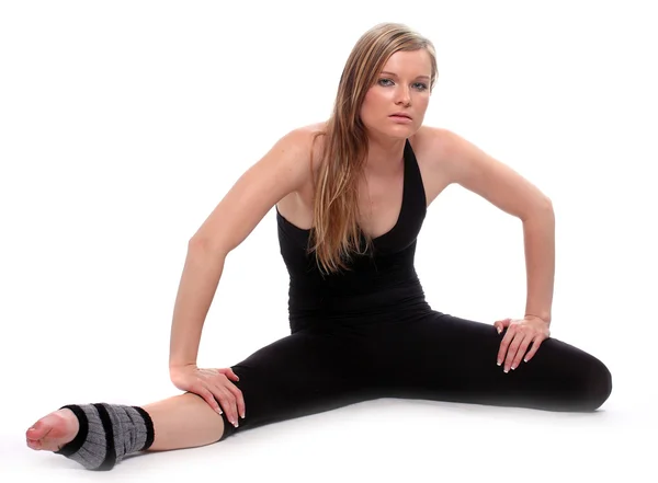 Donna sportiva stretching — Foto Stock