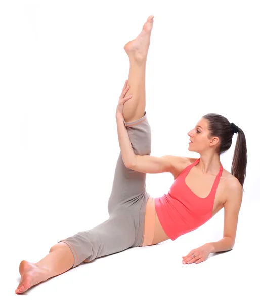 Shot of exercising young woman — Stock Photo, Image