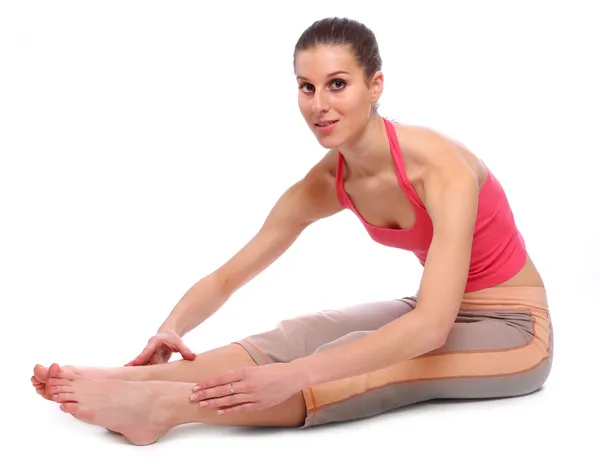 Shot of exercising young woman — Stock Photo, Image