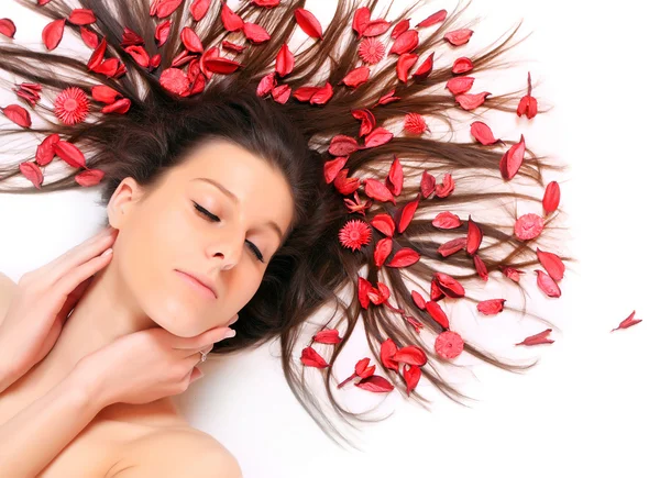 Woman with flowers on hair — Stock Photo, Image