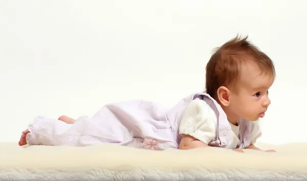 Baby on sheepskin — Stock Photo, Image