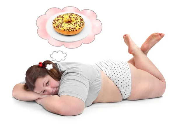 Imagen divertida de una mujer hambrienta con sobrepeso descansando —  Fotos de Stock