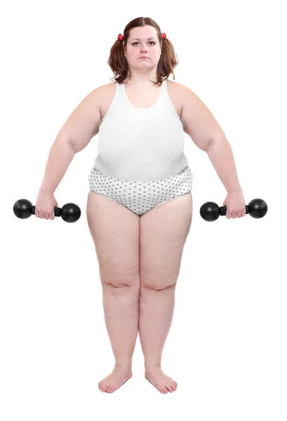 Gelukkig overgewicht vrouw uitoefenen op witte achtergrond. — Stockfoto