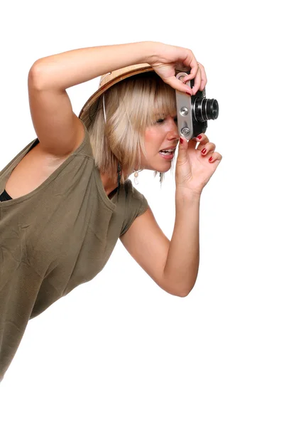 Young woman with digital camera dressed on safari suit. — Stock Photo, Image