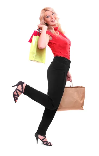 Mooie vrouw met shopping tassen — Stockfoto