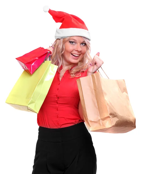 Hübsche Frau im Weihnachtsmann-Kostüm einkaufen — Stockfoto