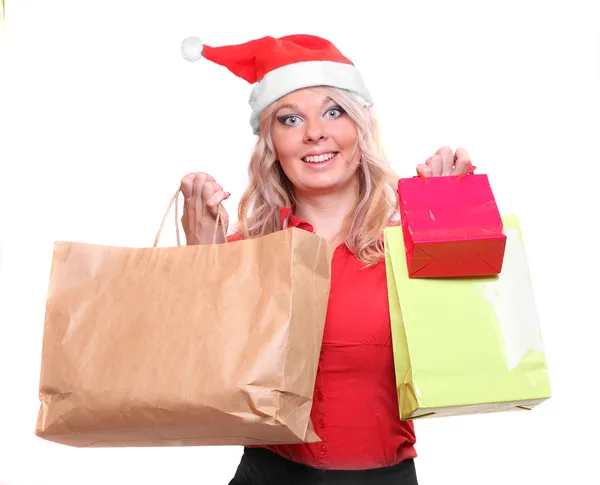 Hübsche Frau im Weihnachtsmann-Kostüm einkaufen — Stockfoto