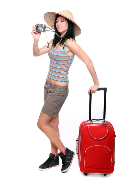 Mujer de vacaciones con cámara y su maleta . — Foto de Stock