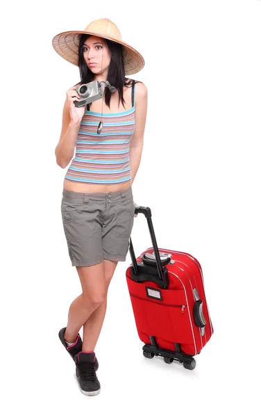 Woman going on vacation with camera and her suitcase. — Stock Photo, Image