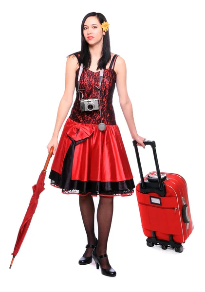 Mladá žena, které se chystáte na dovolenou s kufrem. — Stock fotografie