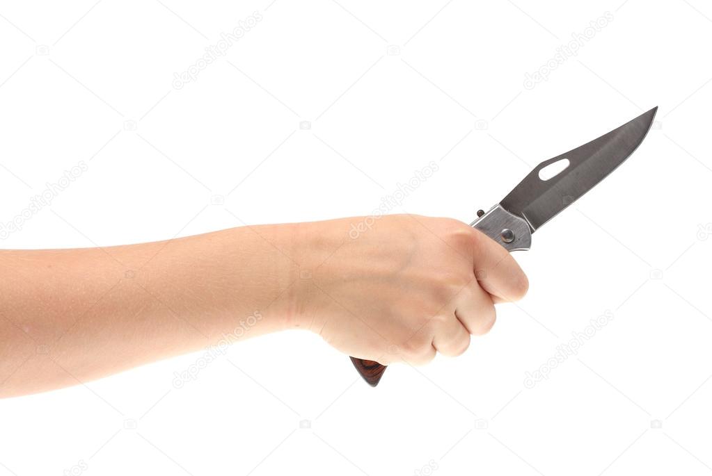Female hand with knife.
