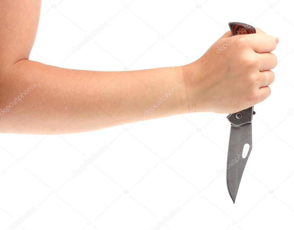 Female hand with knife.