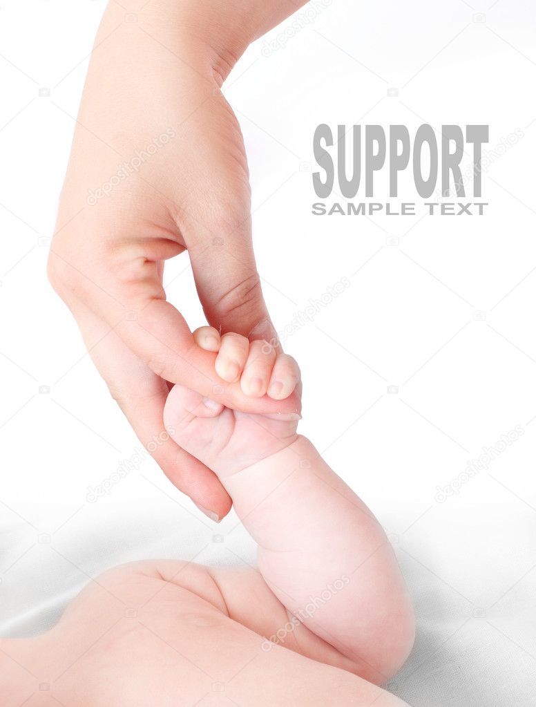 Mothers and baby hand.