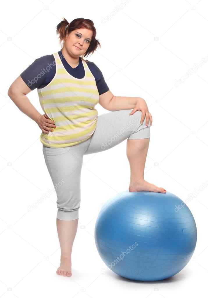 Overweight woman with blue ball
