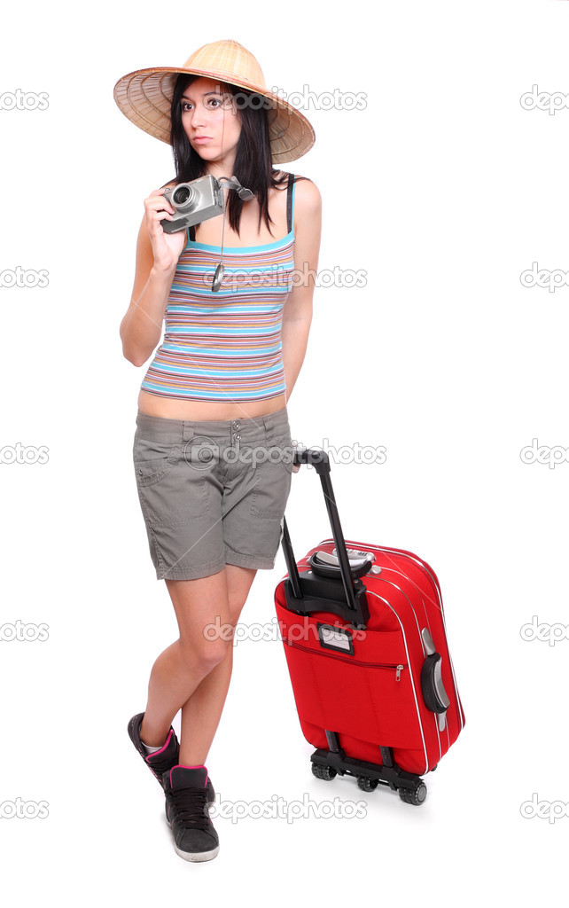 Woman going on vacation with camera and her suitcase.