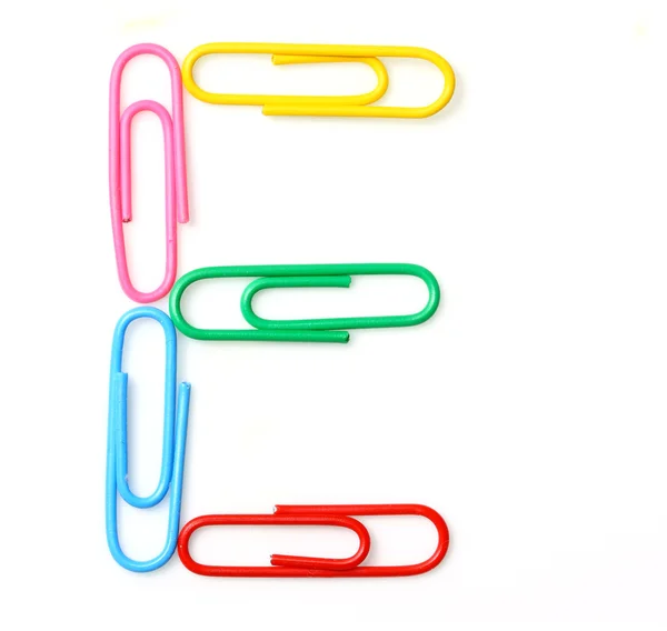 Colorful letter E from paperclips. — Stock Photo, Image