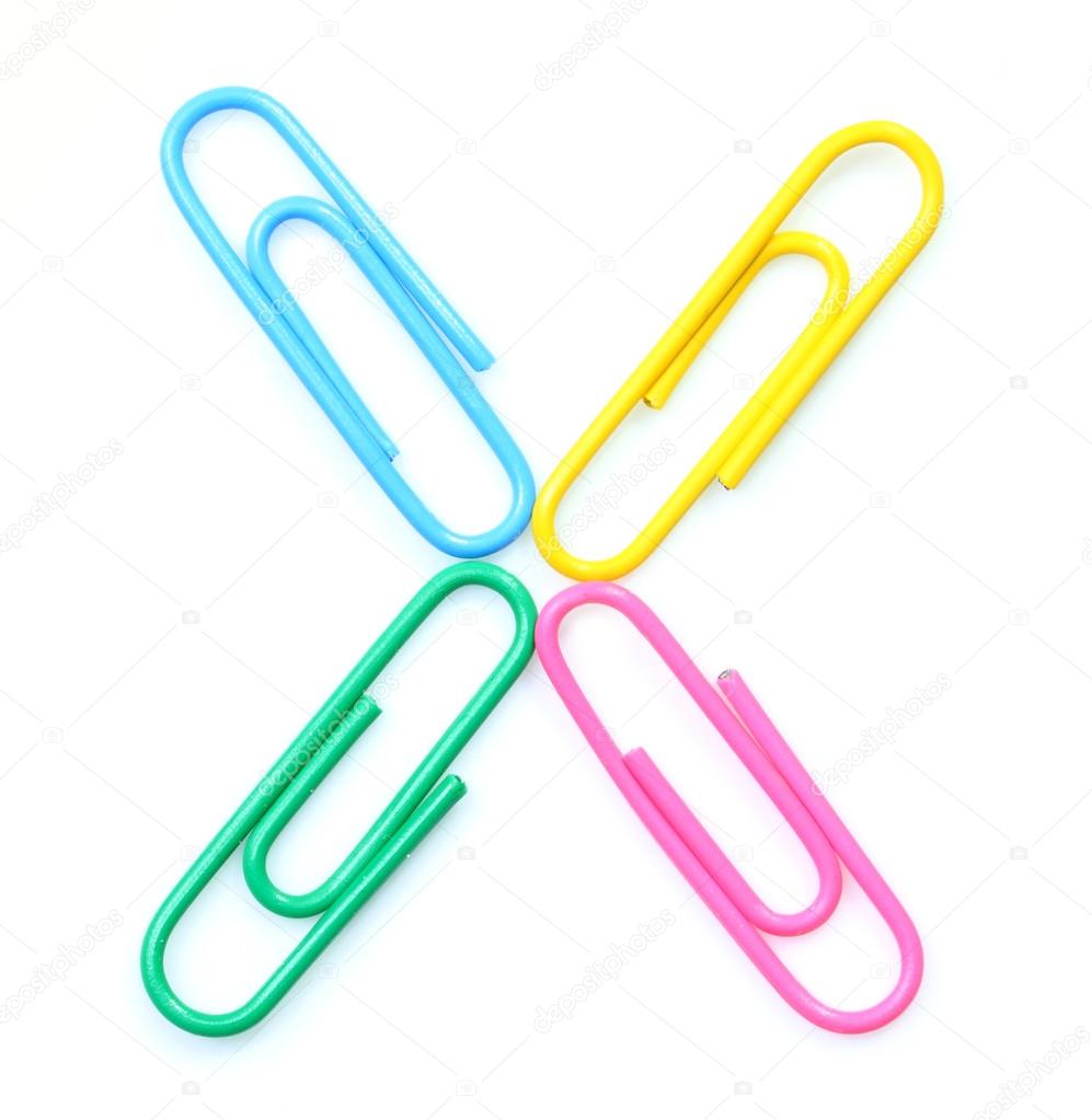 Colorful letter X from paperclips.