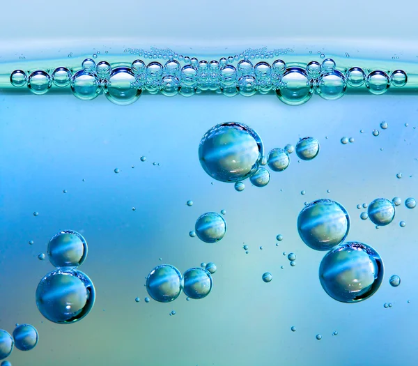 Bubbels in vloeistof - abstracte aard achtergrond. — Stockfoto