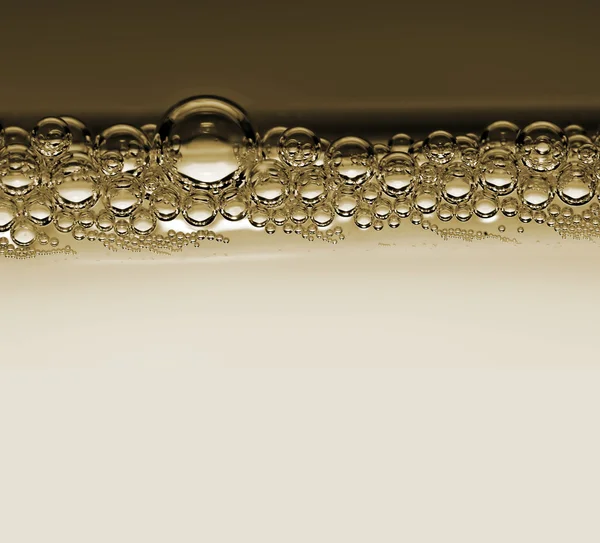 Bubblor i flytande - abstrakt natur bakgrund. — Stockfoto