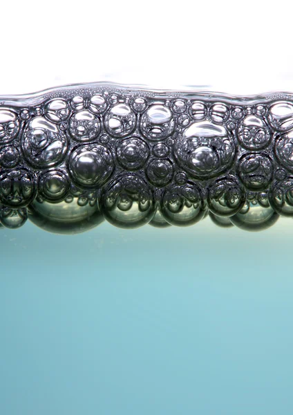 Burbujas en líquido - fondo de naturaleza abstracta . — Foto de Stock