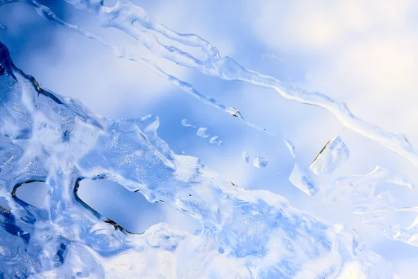 Close up of a icicle against sunny sky. — Stock Photo, Image