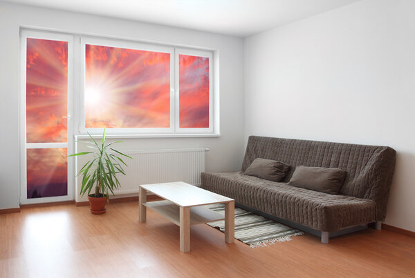 Living room with beautiful sunset view