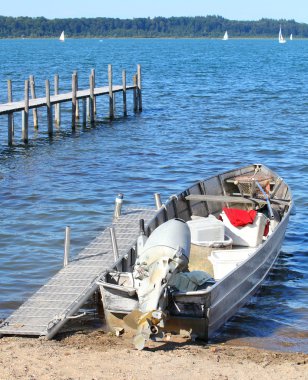 Fishing boat on lake clipart
