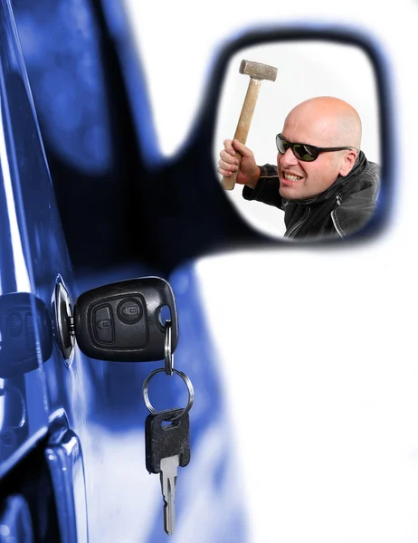 Dangerous thief in rear mirror — Stock Photo, Image