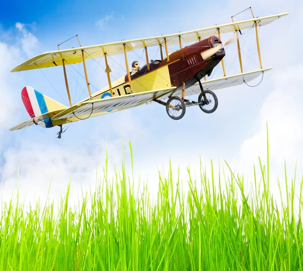 Flying biplane — Stock Photo, Image