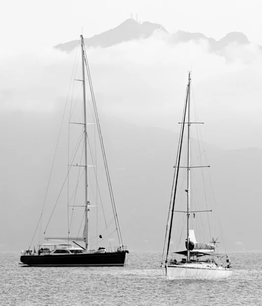 Two sail boats in early morning against Mount Capanne — Stock Photo, Image