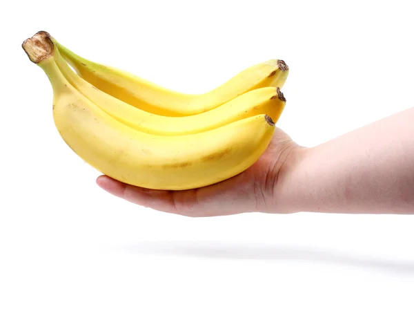 Bando de bananas maduras na mão feminina — Fotografia de Stock