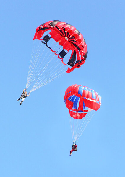 Skydivers flying