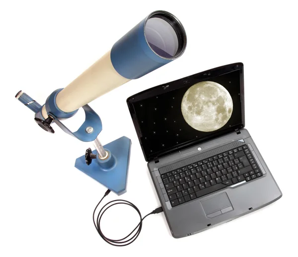 Инвертирующий телескоп с ноутбуком — стоковое фото