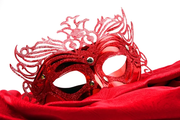 Decorated mask for masquerade on red velvet. — Stock Photo, Image