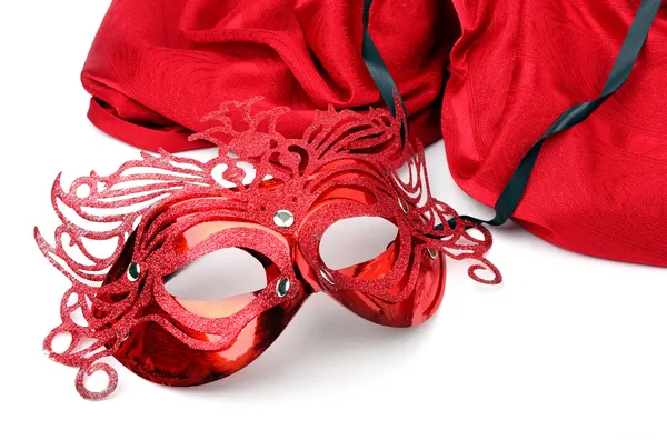 Decorated mask for masquerade on red velvet. — Stock Photo, Image