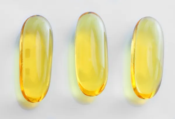 Omega-3 pills - close up with shallow DOF. — Stockfoto