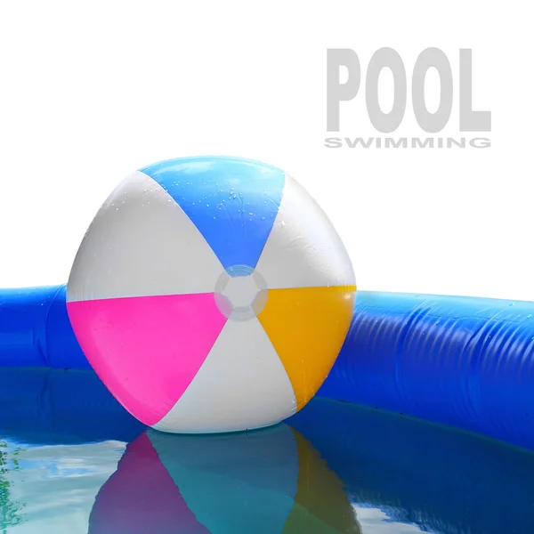 Inflatable pool with floating plastic ball. — Stock Photo, Image