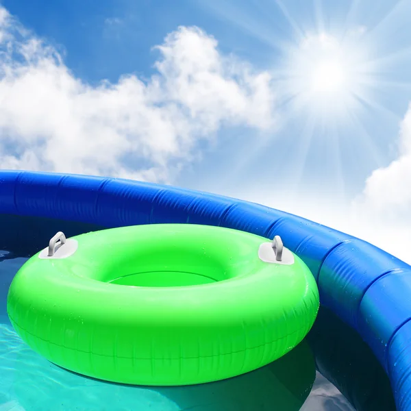 Inflatable pool with floating lifebuoy. — Stock Photo, Image