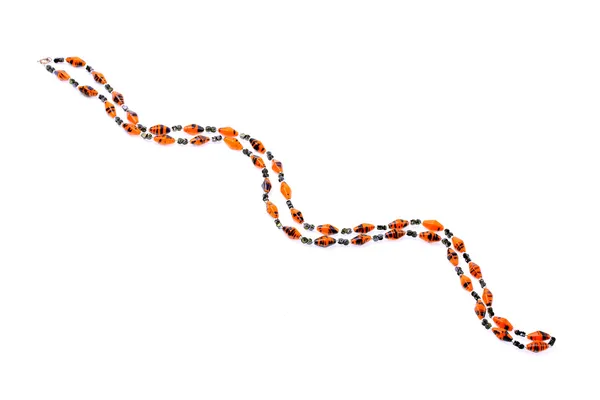 Schlange aus indischer roter Halskette - einheimische Handarbeit. — Stockfoto