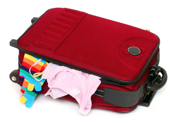 Unpacked suitcase — Stock Photo, Image